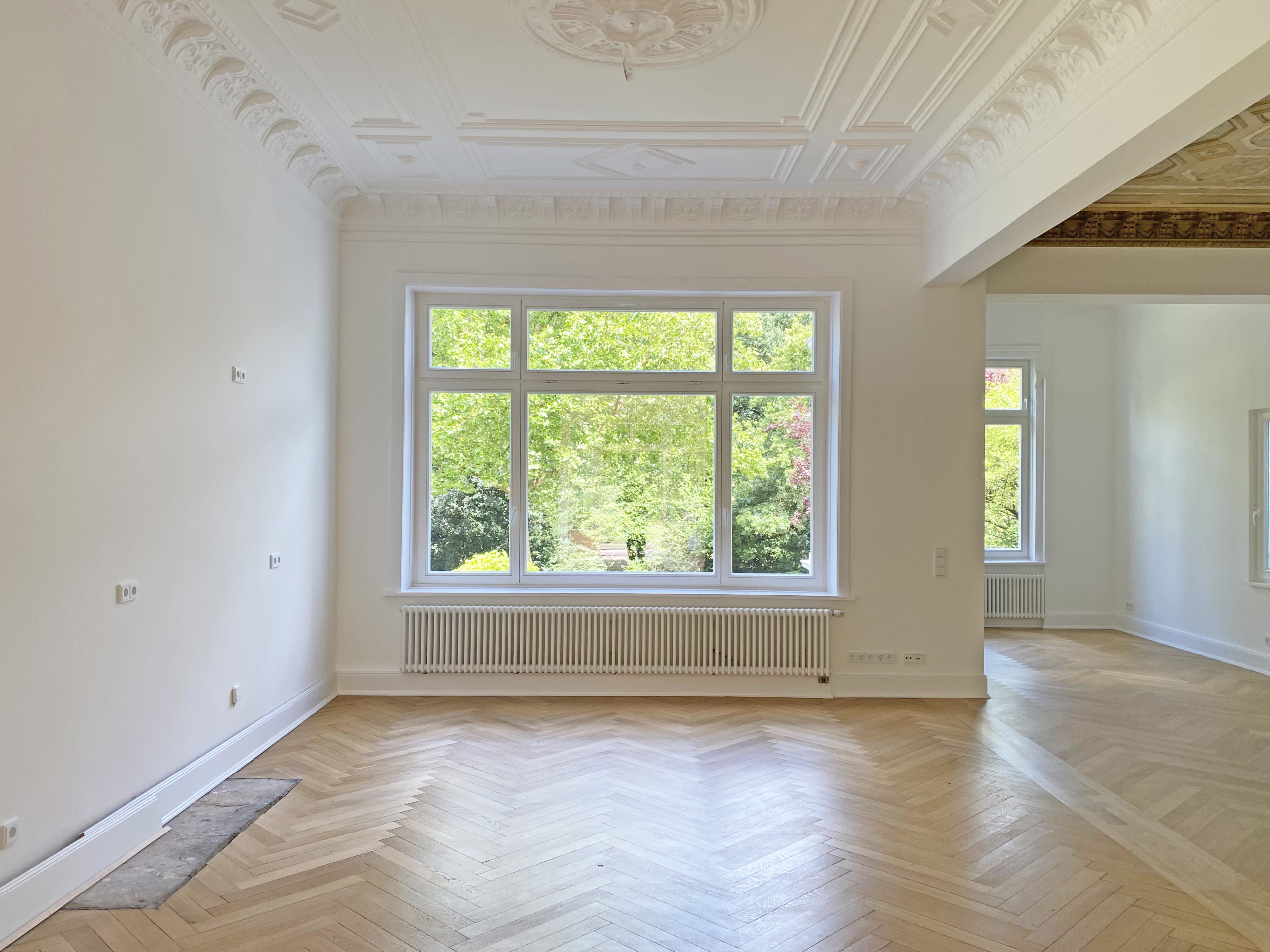 Erdgeschosswohnung mit großem Süd-/Westgarten in Harvestehude